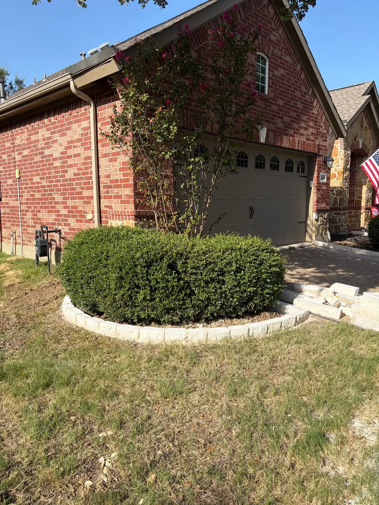 finished curved stone border around tree