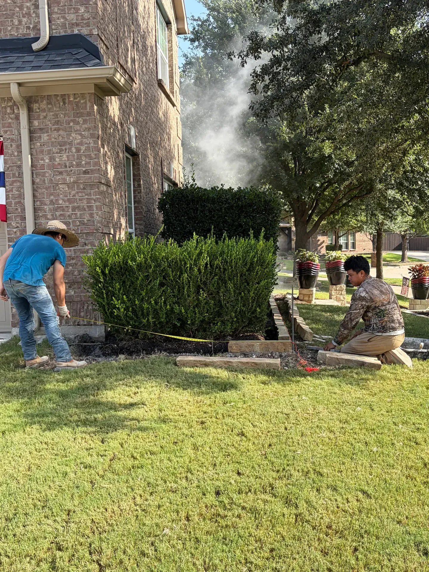 crew cutting and setting border stone