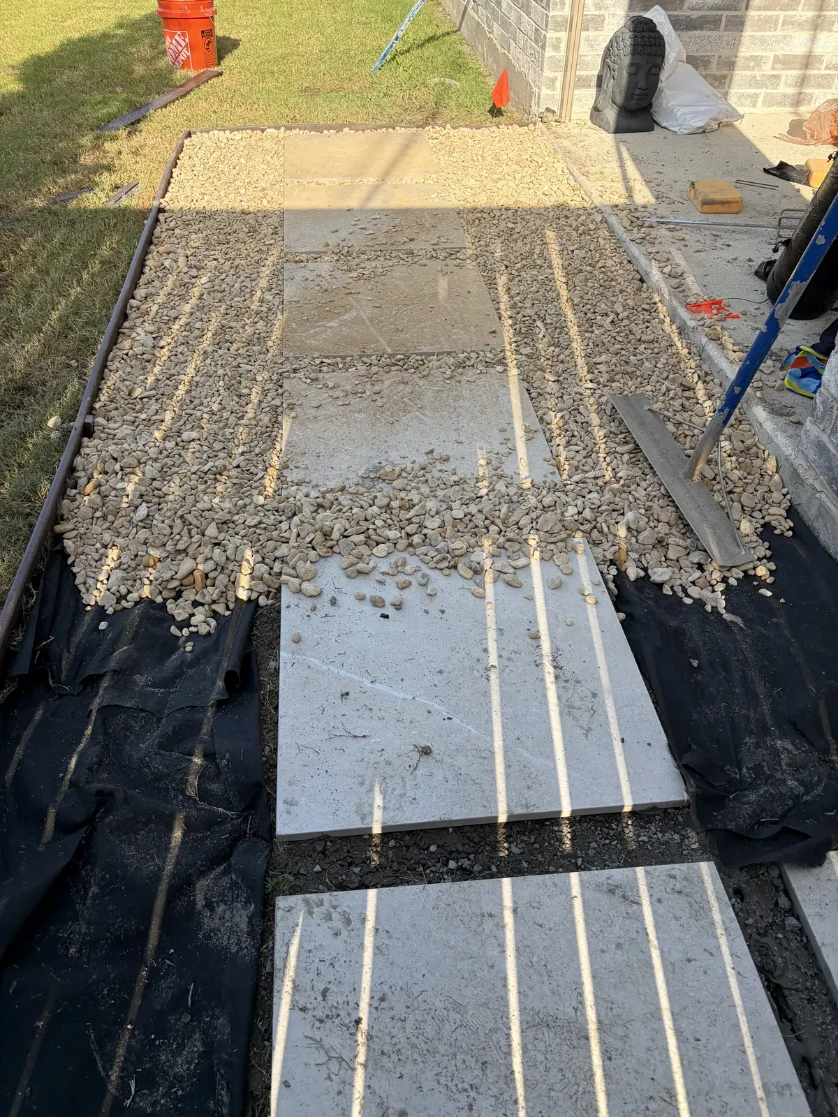 Walkway fabric and gravel installation detail