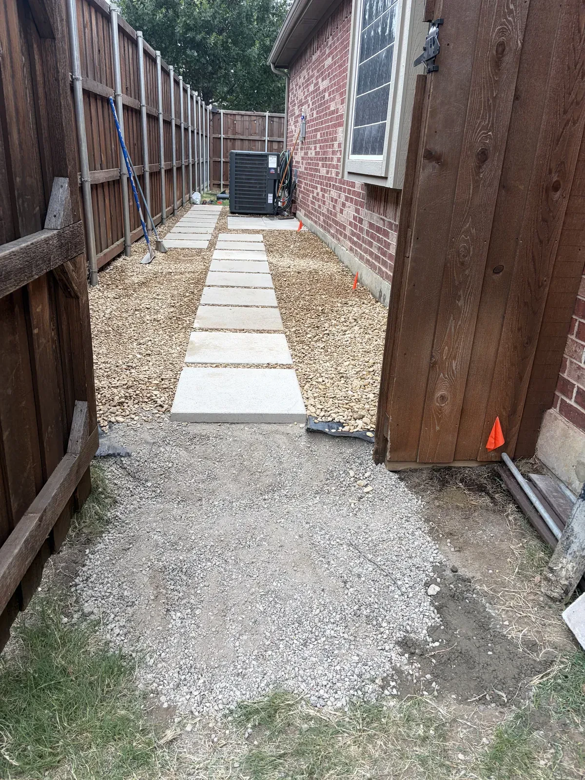 Gravel fill beside newly placed stepping stones