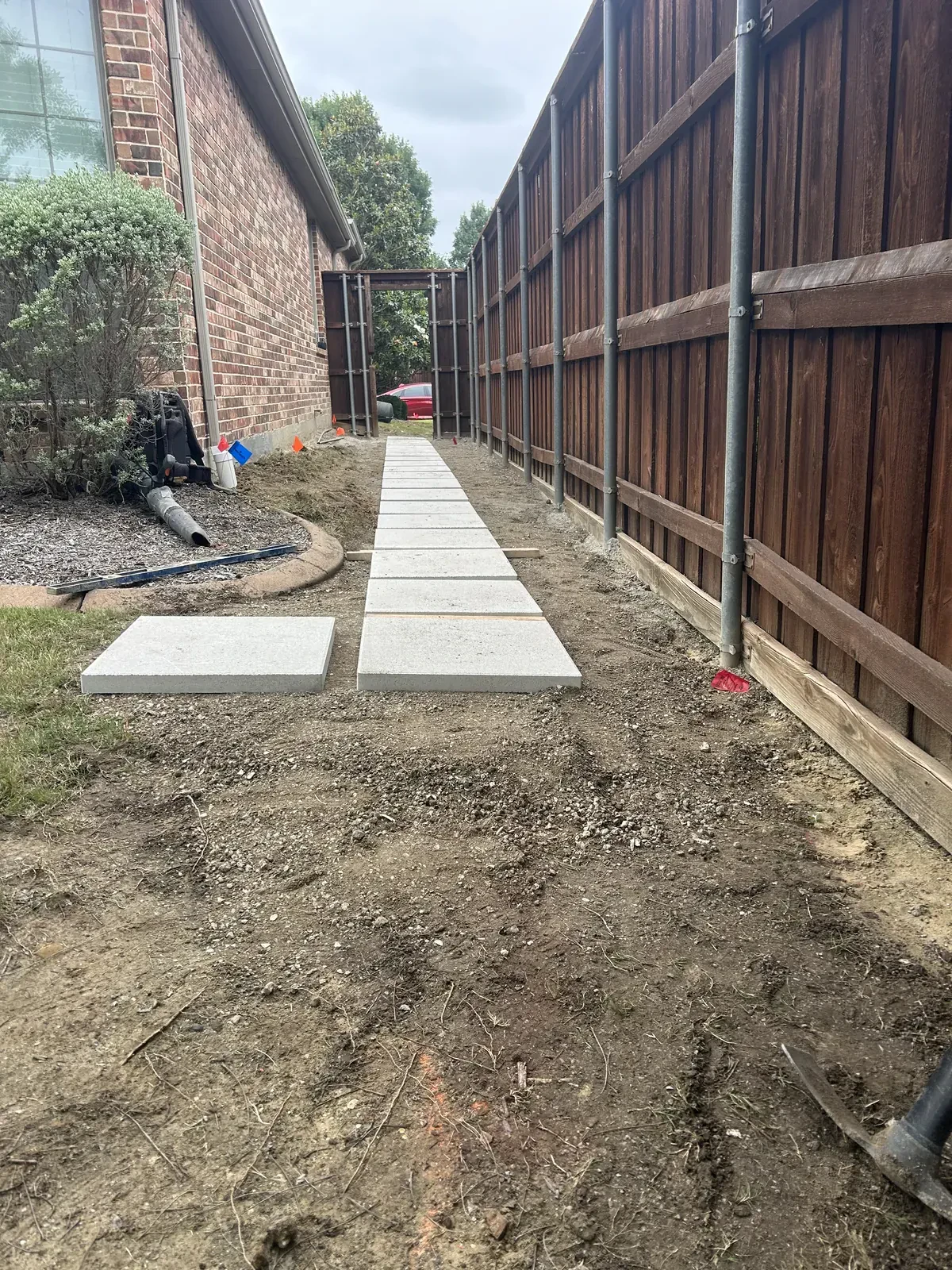 Stepping stone layout beside curved landscape border